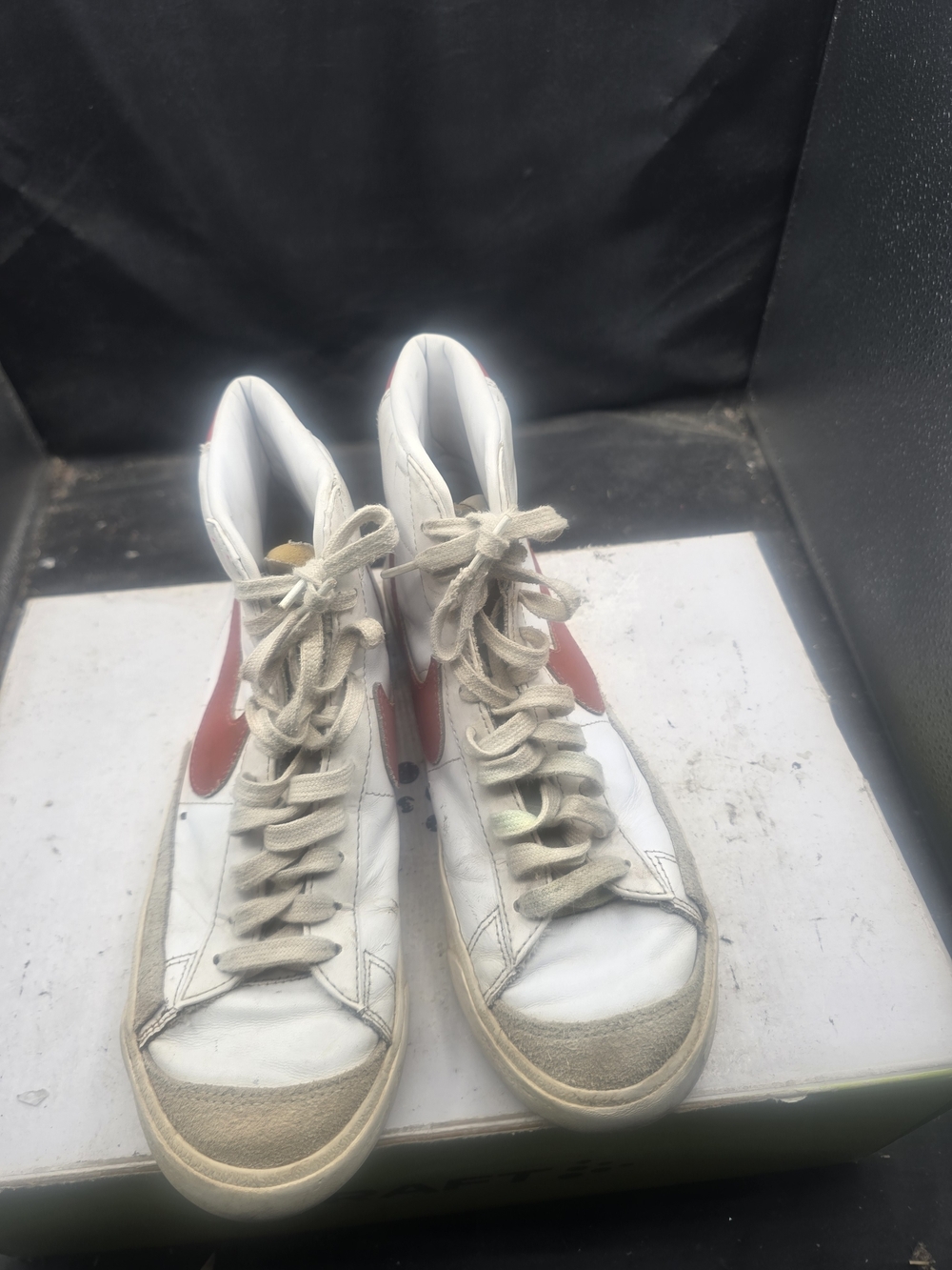 Nike Women's White High-Top Sneakers with Red Swoosh